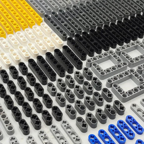 Beam Set With 266 Pieces For STEM Engineering And Car Building Projects Includes Chassis Frames Liftarms Axles And Connectors displayed.