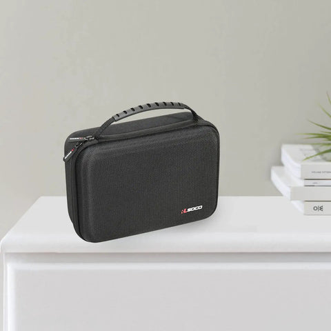 Hard Carrying Case For MC-101 And TR-6S Compact Music Production Station shown on table, beefy shell, secure latches, black case.
