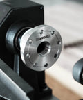 Heavy Duty 1x8Tpi Face Plate Kit For Woodturning Lathes Including 2 3 4 And 6 Inch Plates mounted on a lathe.