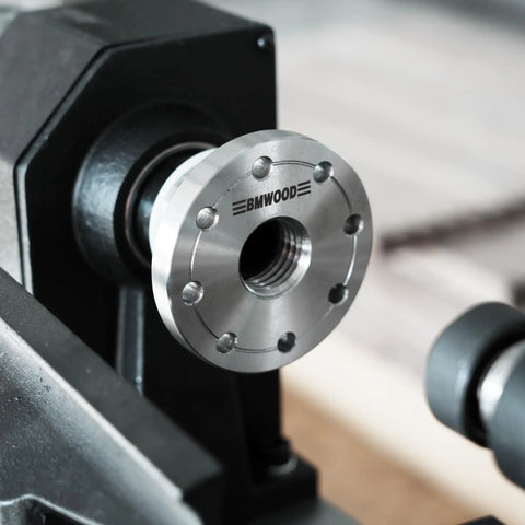 Heavy Duty 1x8Tpi Face Plate Kit For Woodturning Lathes Including 2 3 4 And 6 Inch Plates mounted on a lathe.