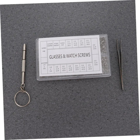 Premium Stainless Steel Micro Screw Kit With Tiny Screwdriver And Tweezers Dead Simple Glasses And Watch Repairs on gray background.