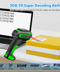 Long Range UHF RFID Barcode Scanner With 2D 1D And QR Reading scanning a package next to a laptop.