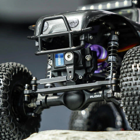 Close-up of installed 7Kg Waterproof 2065 Servo With Mount And Horn For 1/24 Axial SCX24 RC Crawler Upgrade on vehicle