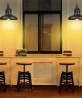 Indoor view of two pack black wall lanterns outdoor indoor barn sconce lights classic modern gooseneck exterior lighting for farmhouse style.
