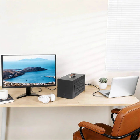 Beefy Thunderbolt 3 External Graphics Dock Paired With 750W Power Supply on desk with monitor and laptop setup.
