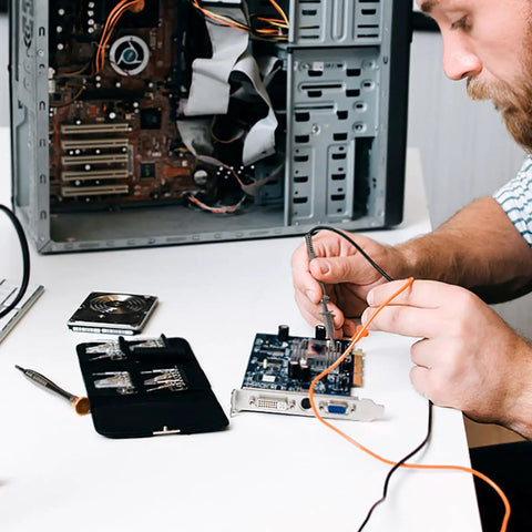 Person using Four Pack 100 MHz 600V DC High Sensitivity Oscilloscope Clip Probe With Switchable Ten To One And One To One on circuit board