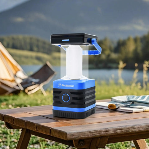 Go-To Solar Rechargeable Lantern For Camping And Hiking, 1000 Lumen LED Light with 5 Modes on wooden table by lake campsite