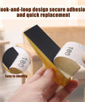 Micro Detail Sander Kit With 60 Assorted Sandpapers 60/80/120/180/240/320 Grit in hand showing hook-and-loop design