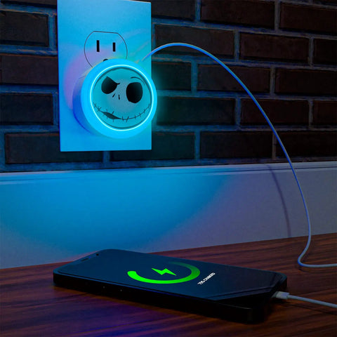 Tim Burton Nightmare Before Christmas LED Night Light with USB charging Jack Skellington face glowing in dark room setting.
