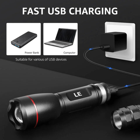 Rechargeable LED Flashlight With Zoomable Beam, 1000 Lumens Beast Bright, Waterproof, shown charging via USB with power bank and laptop