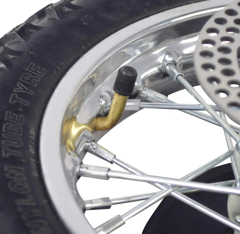 Close-up of rim and valve stem of Rear Wheel Replacement Kit for Razor MX500 MX650 Dirt Rocket Off Road Ready with tire and spokes.