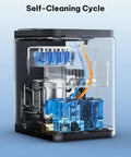 Self Cleaning Countertop Ice Maker Slams Out Bullet Ice In Six Minutes Whisper Quiet Operation showing internal components during self-cleaning cycle.