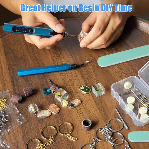 Front view of blue electric resin drill kit with bits, deburring tool, and polishing accessories for jewelry making.