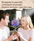 Couple holding 3D Dahlia Flower Wooden Puzzle Kit for adults, assembled as purple flower sculpture, suitable for decor.
