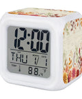 Chill Autumn Floral Silent Alarm Clock With Smooth Snooze And Soft Glowing Nightlight Hella Compact Desk Time Date And Temp Display For Bedrooms And Home Offices showing time, temperature, and floral design.