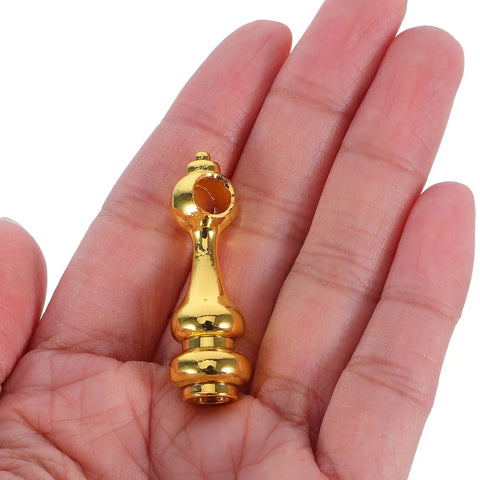 Hand holding a piece from the Golden Zinc Alloy Shelf Rail Brackets Set 24 Pieces With Enhanced Stability To Prevent Unwanted Movement