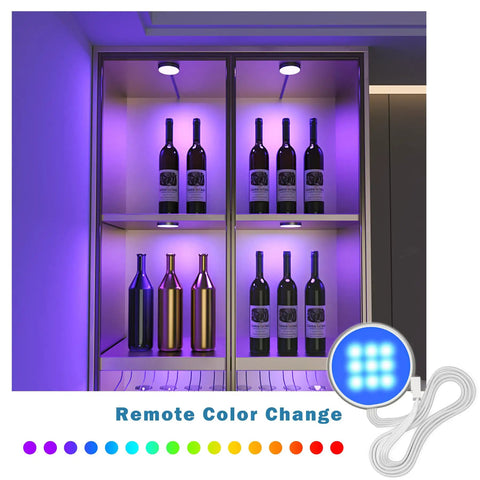 Under Cabinet Lighting Kit With RGB Puck Lights And Remote Color Changing 12V Plug In LED Kit illuminating wine display