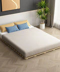 Durable Foldable Floor Bed Frame For Queen Size With Breathable Wooden Slats Rolling Futon Base featuring a low profile design in a modern room.