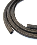 Close-up of Black Trim Guard 1/16 Inch Thick 15 Feet Long Easy Install Edge Protector showing rubber material and texture detail.