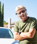 Man wearing All-Day Anti-Fog Safety Goggles With Full Face Shield For All-Day Eye Protection, clear lens outdoors