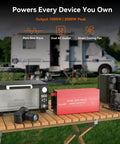 Pure Sine Wave Inverter 1000W Continuous Power With 2000W Peak on table powering camera, microwave, coffee maker near RV.