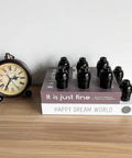 E26 E27 Light Socket Set, Retro Black Edison Pendant Holders on books beside a clock, 250W Max, Fire Safe, UL Listed