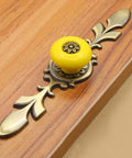 Dang Solid Vintage Ceramic Cabinet Knobs And Drawer Pulls 8 Pack Petal Design Zinc Alloy Back Plate Hardware For Kitchen Wardrobe With Easy Peasy Install, yellow ceramic knob with brass backplate.