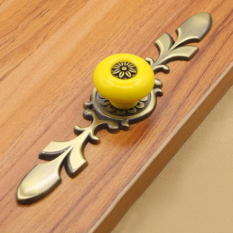 Dang Solid Vintage Ceramic Cabinet Knobs And Drawer Pulls 8 Pack Petal Design Zinc Alloy Back Plate Hardware For Kitchen Wardrobe With Easy Peasy Install, yellow ceramic knob with brass backplate.