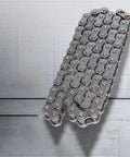 Top Notch 1 Meter 08B Precision Roller Chain Short Pitch Single Row Drive Sprocket Heavy Duty industrial cables for machinery repairs on a gray background.