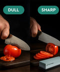 Two Sided Whetstone Knife Sharpening Stone 400/1000 Grit Kit With Flattening Stone shown sharpening knife to slice tomato