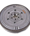 Heavy Duty Dual Mass Flywheel Built Crazy Tough For Smooth Shifting And Hella Reliable Torque Dampening Direct Bolt On German Engineering Straight Up Street Beast, showing top view with precision balanced silver finish.