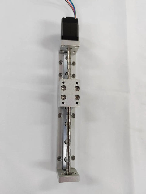 Sick Mini Linear Actuator With Motor And Lead Screw 100 mm Stroke for precise CNC setup with metal housing and wiring.