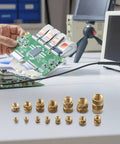 300 Piece Heat Set Threaded Inserts Kit M2 To M6 And One Quarter Twenty Brass Knurled Nuts For 3D Printing PLA ABS Repair Mixed Pack Copper Forging For Strong Durable Joints. brass inserts on PCB repair bench
