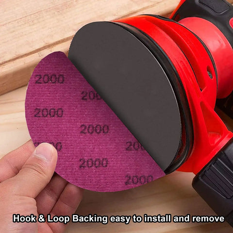 Installing Five Inch Sanding Discs Set, 60 Pcs Hook And Loop, Grits 320 600 800 1200 1500 2000 With Tack Cloth on sander