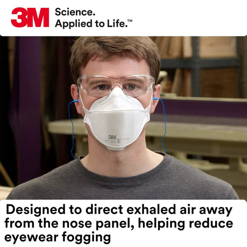 Man wearing Aura N95 Particulate Respirator 9210 Plus with glasses, demonstrating reduced eyewear fogging feature indoors