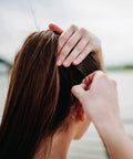 Professional Ball Tipped Bobby Pins Lock It Down With An Insanely Secure Crimped Grip Perfect For Updos And Taming Flyaways 400 Count Black Hair Clips For Everyday Styling in use on ponytail.