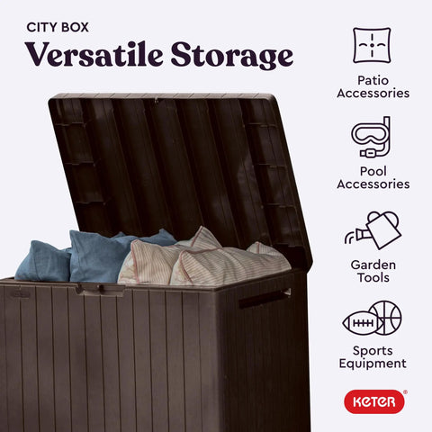 30 Gallon Resin Outdoor Storage Box and Patio Furniture Side Table for Pool and Garden Accessories, lid open with cushions