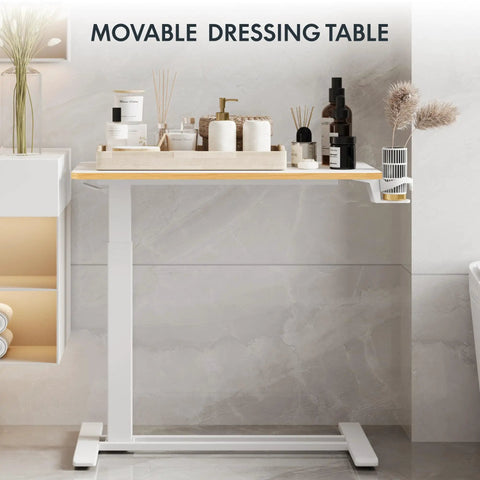 32 Inch Mobile Standing Desk Featuring A Slick Rolling Base And Hassle Free Pneumatic Height Adjustments With Smooth One Hand Gas Spring Lift For Compact Home Office Computer Workstation Setup in a modern bathroom.