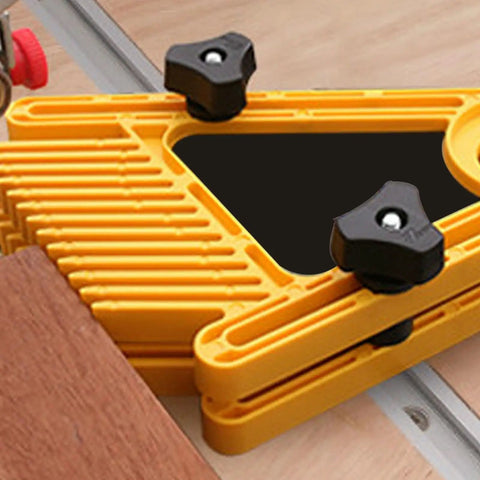 Close-up of yellow angle tool used on woodworking table with Aluminum T Track Sliding Slot Rail for precise setup
