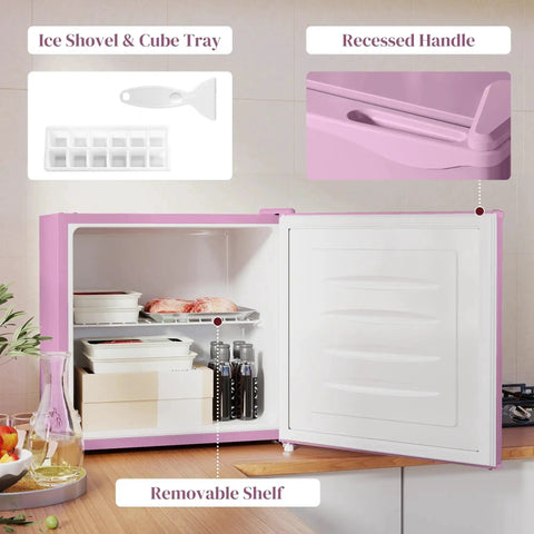 Slick 1.1 Cu Ft Compact Countertop Upright Freezer Featuring Smooth Temperature Dial And Handy Removable Shelf In Vibrant Pink interior with ice shovel, cube tray, and removable shelf.