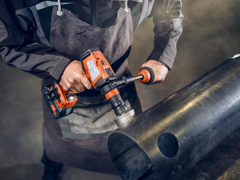 Worker using 18V Brushless Cordless Drill Driver Set Packs Badass Torque And Four Speeds Hammer Mode on metal.