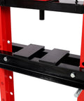 Close-up view of Heavy Duty 20 Ton Hydraulic Shop Press With Easy Read Pressure Dial, highlighting black steel plates and red frame.
