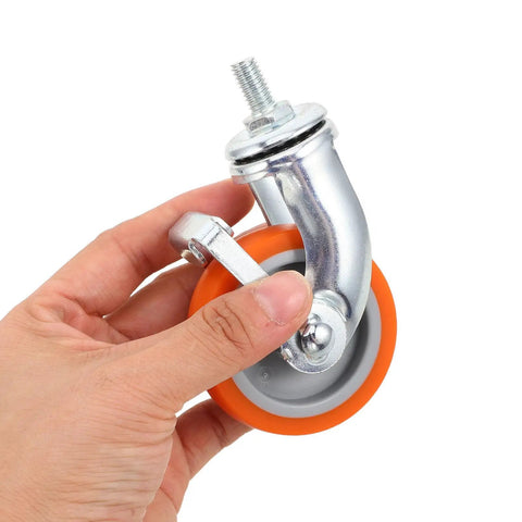 4pcs Inch TPR Swivel Caster Wheels with Brake, M8 Post held in hand, featuring orange rubber wheel and metal swivel action.