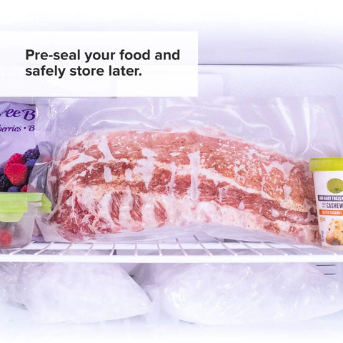 Two Roll Vacuum Sealer Bag Rolls for Sous Vide sealing meat, shown in freezer with other items