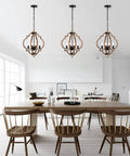 Openwork Quatrefoil Modern Farmhouse Chandelier Handcrafted Wood Frame In Oak Finish Four Light Pendant Ceiling Fixture For Living Room Kitchen Dining Area With Cozy Warm Glow And Chic Vibe above dining table