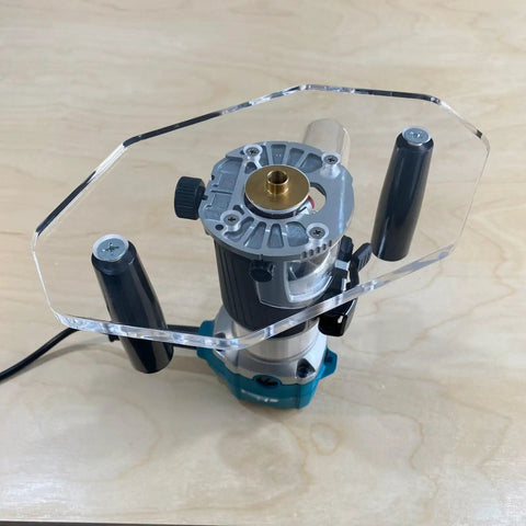 Clear Acrylic Router Base Plate Optimized For Rt0701c And Xtr01z Routers on a compact router, ideal for joinery tasks.