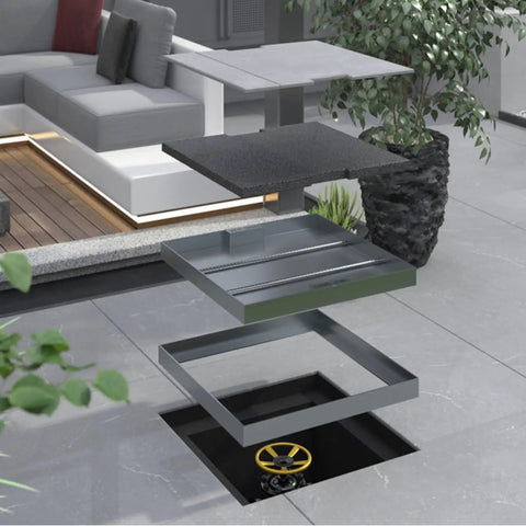 Discreet Backyard Septic Tank Lid 30 By 30 Inch Catch Basin Cover showing stainless steel layers over a drain.