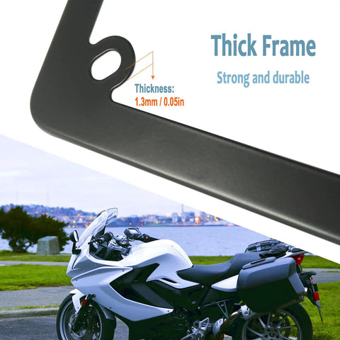 Close-up of Badass Matte Black Stainless Steel Motorcycle License Plate Frame with thick 1.3mm durable edge in scenery.