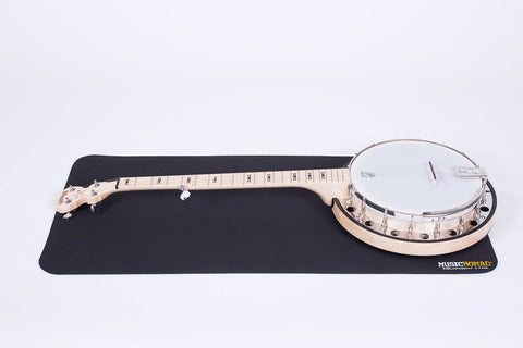 Guitar Repair Work Mat Pad For String Changes And Setup, Large 36 Inch By 17 Inch Work Surface, with a banjo placed on top
