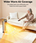 Woman using 1500W PTC Ceramic Space Heater With Remote, LED Touch Display, Four Heat Levels, 110 Degree Oscillation, 10-Hour Timer, UL Certified Safety, Quiet Portable Heater For A Cozy Bedroom Or Office in living room.